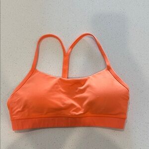 bright orange sports bra